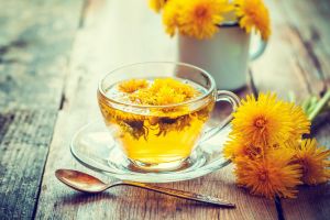 cup-of-healthy-dandelion-tea-herbal-medicine-retro-royalty-free-image-539117696-1538487191